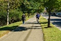 Early Morning Female Walker nad a Male Cyclist